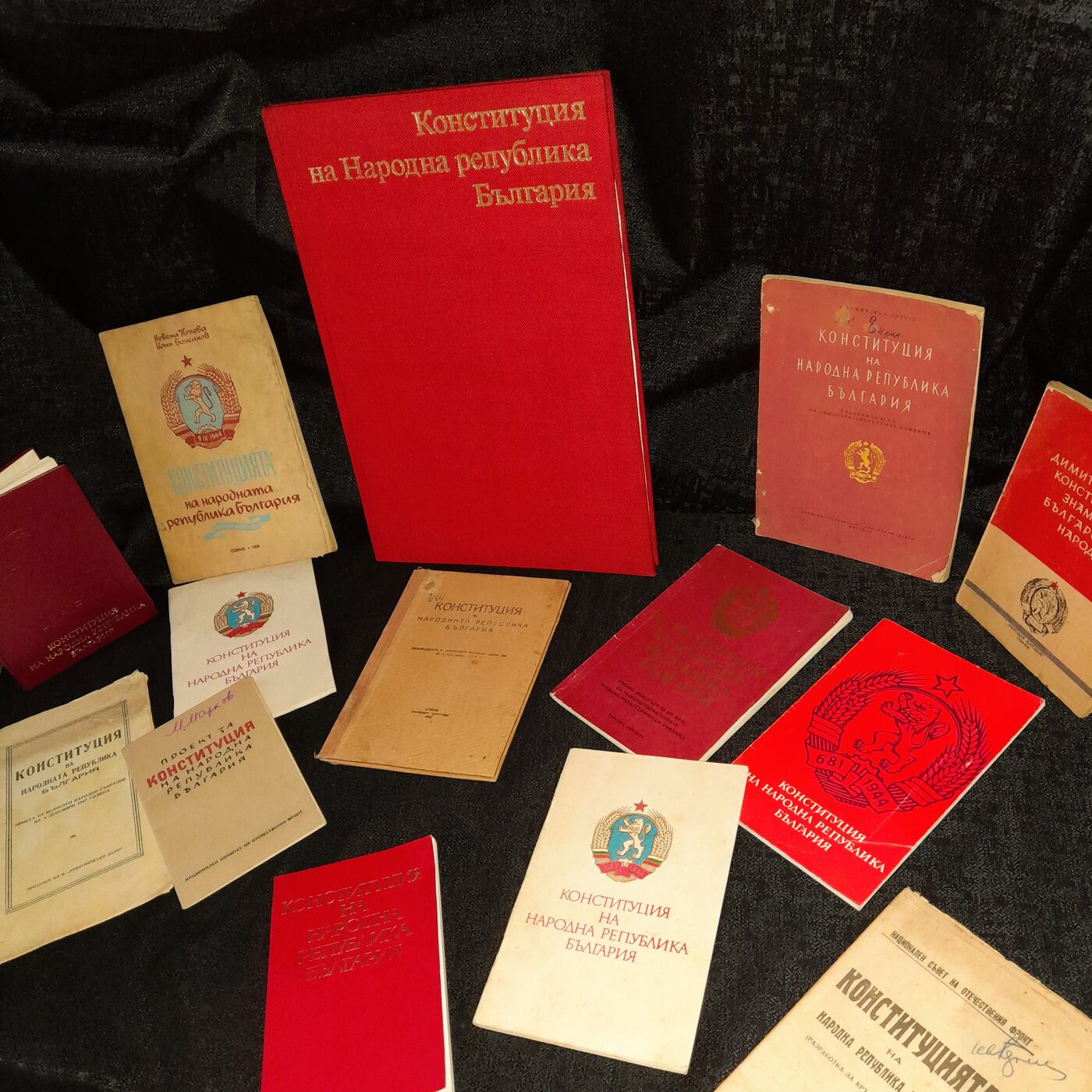 A set of editions of the Constitution of the People's Republic of Bulgaria: bound volumes, pamphlets, school textbooks and drafts submitted for consultation